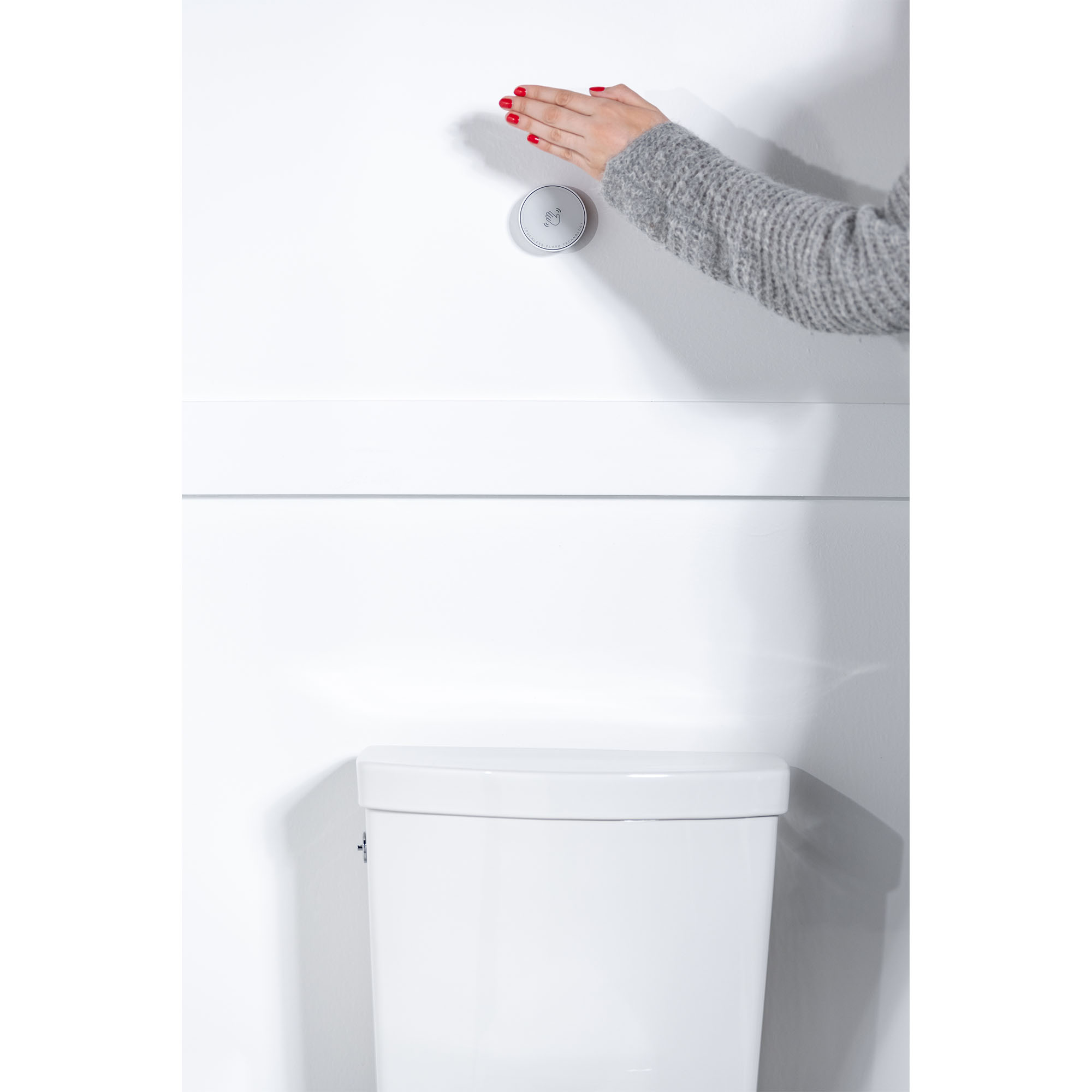 Studio Touchless Skirted Two-Piece 1.28 gpf/4.8 Lpf Chair Height Elongated Toilet with Seat